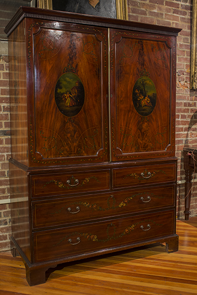 English Mahogany Linen Press with Painted Oval Motif On Doors.