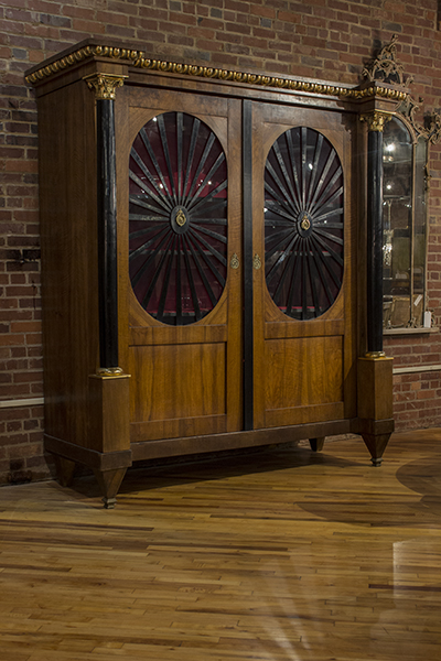 French Neo-Classical Cabinet. The Oval Glazed Inserts on Doors with Ebony Wheel Shaped.