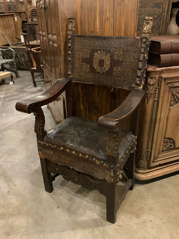 ITALIAN WALNUT AND EMBOSSED LEATHER ARMCHAIR
