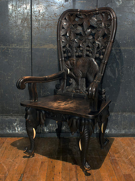 Black Forest Elephant Armchair with Accented Features such as Tusk, Trunk. Carved Flower Accents, Peter Abegglen Switzerland