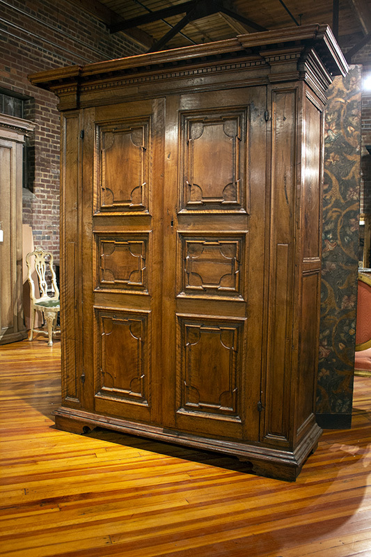 Italian Two Door Cabinet with Paneled Doors and Dental Moulding Detail